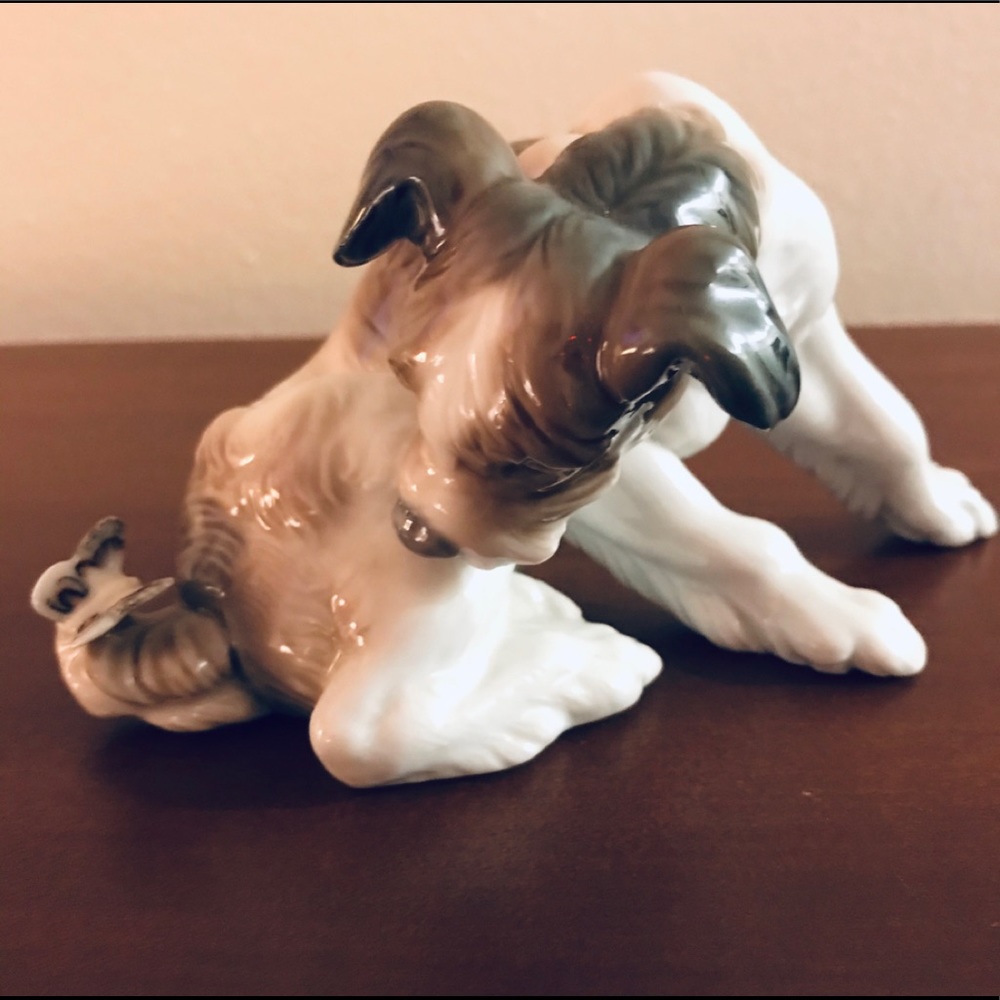 Lladro’s Animal Collection “Dog And Butterfly”